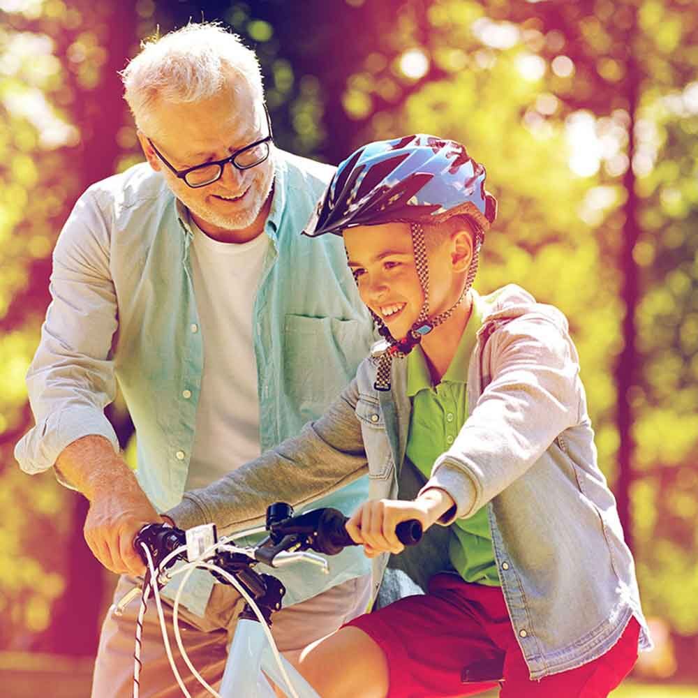 Kid learning to ride bike