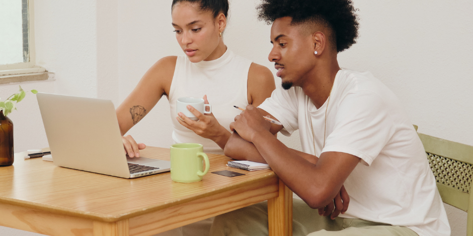 Couple Using Laptop