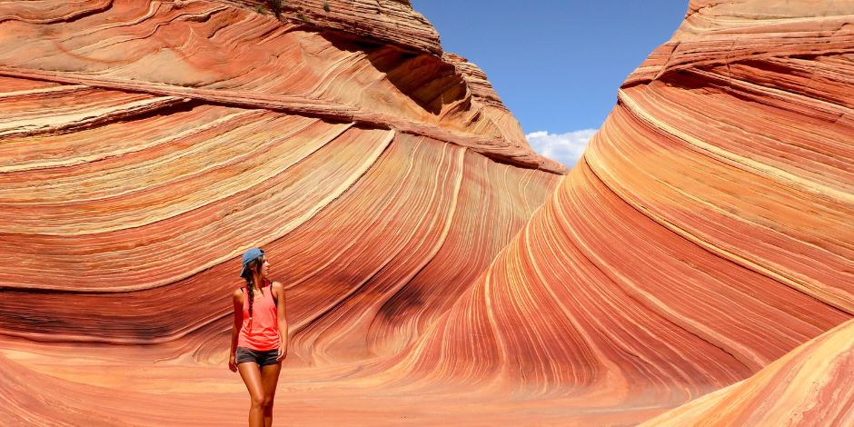 Woman Walking in a Desert Canyon