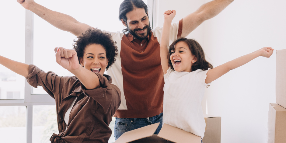 Family Celebrating in Their New Home