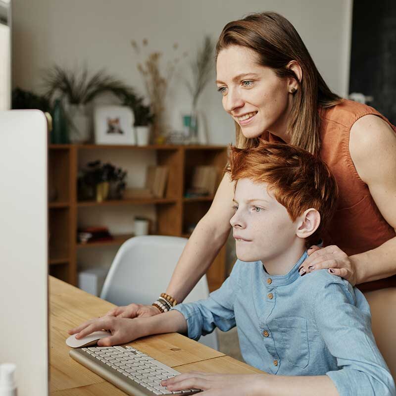 Boy looking at iMac